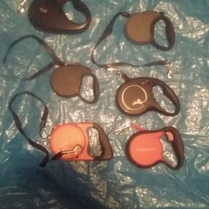 Dog leashes black and red Flexi and Tug. Original/$20.